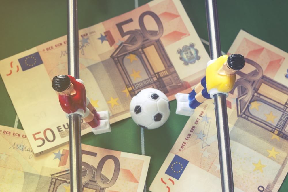 Sports,And,Money.,Concept,About,Money,Spending,In,Football,(soccer),