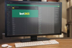 Bet365,Betting,Website,On,Computer,Screen.,Monitor,,Keyboard,And,Airpods